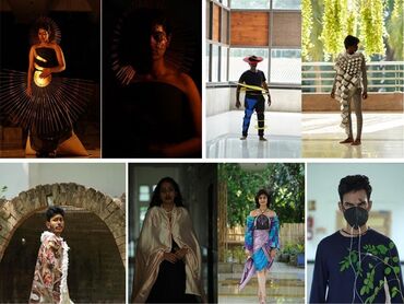 Two men in bicycle jerseys sitting outside at table having coffee